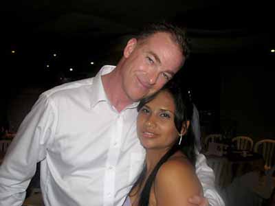 A foreign man with a beautiful Latin woman on a date.